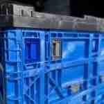 close up of blue storage delivery crate